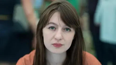 Irish author Sally Rooney claims she will not enter the UK over arrest fears